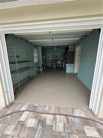 a view of room with a furniture and a fireplace