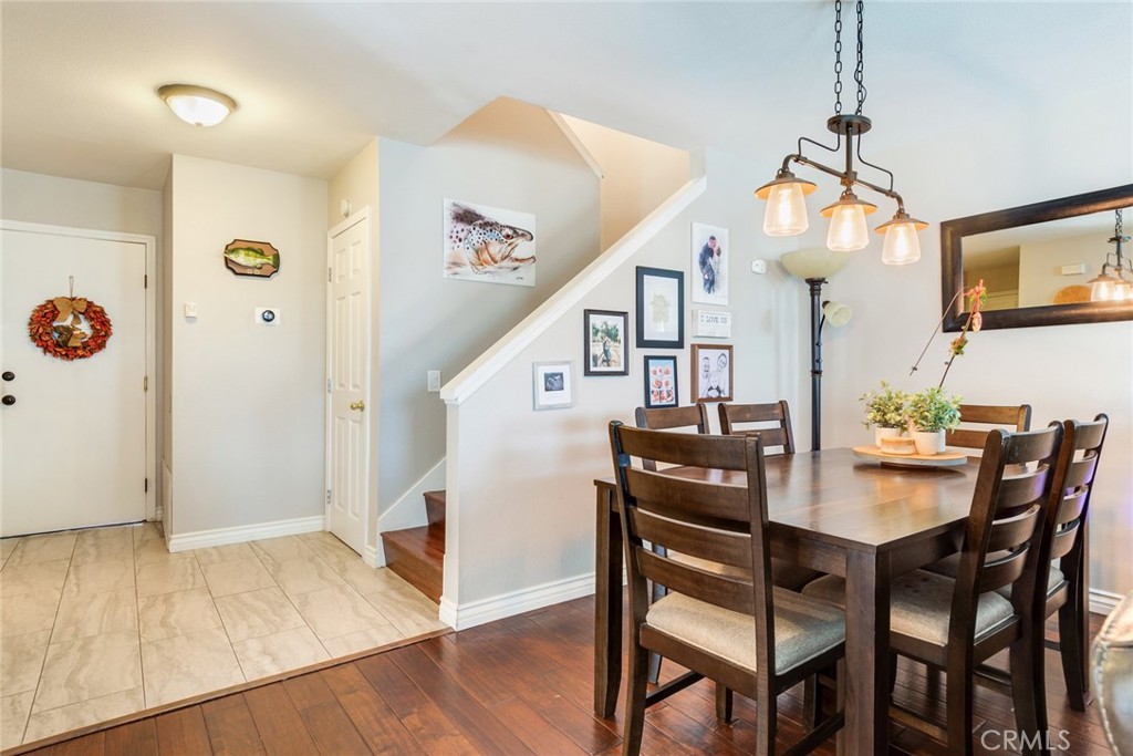 1182 Mountain Gate Road Upland, CA 91786 - Photo 5 of 25 Large dining area with newer flooring though out along with lighting fixtures and paint