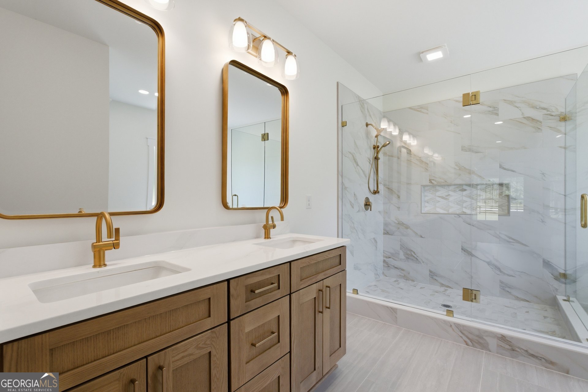 5938 Ridgeway Road Franklin, GA 30217 - Photo 22 of 41 a bathroom with a double vanity sink mirror double and shower