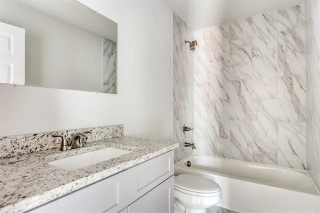 a house with a tree in front of it