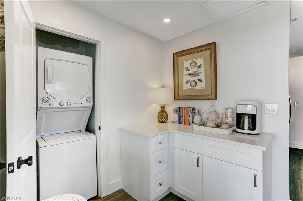 1793 Smugglers Cove, Unit B Naples, FL 34112 - Photo 16 of 24 a view of cabinets