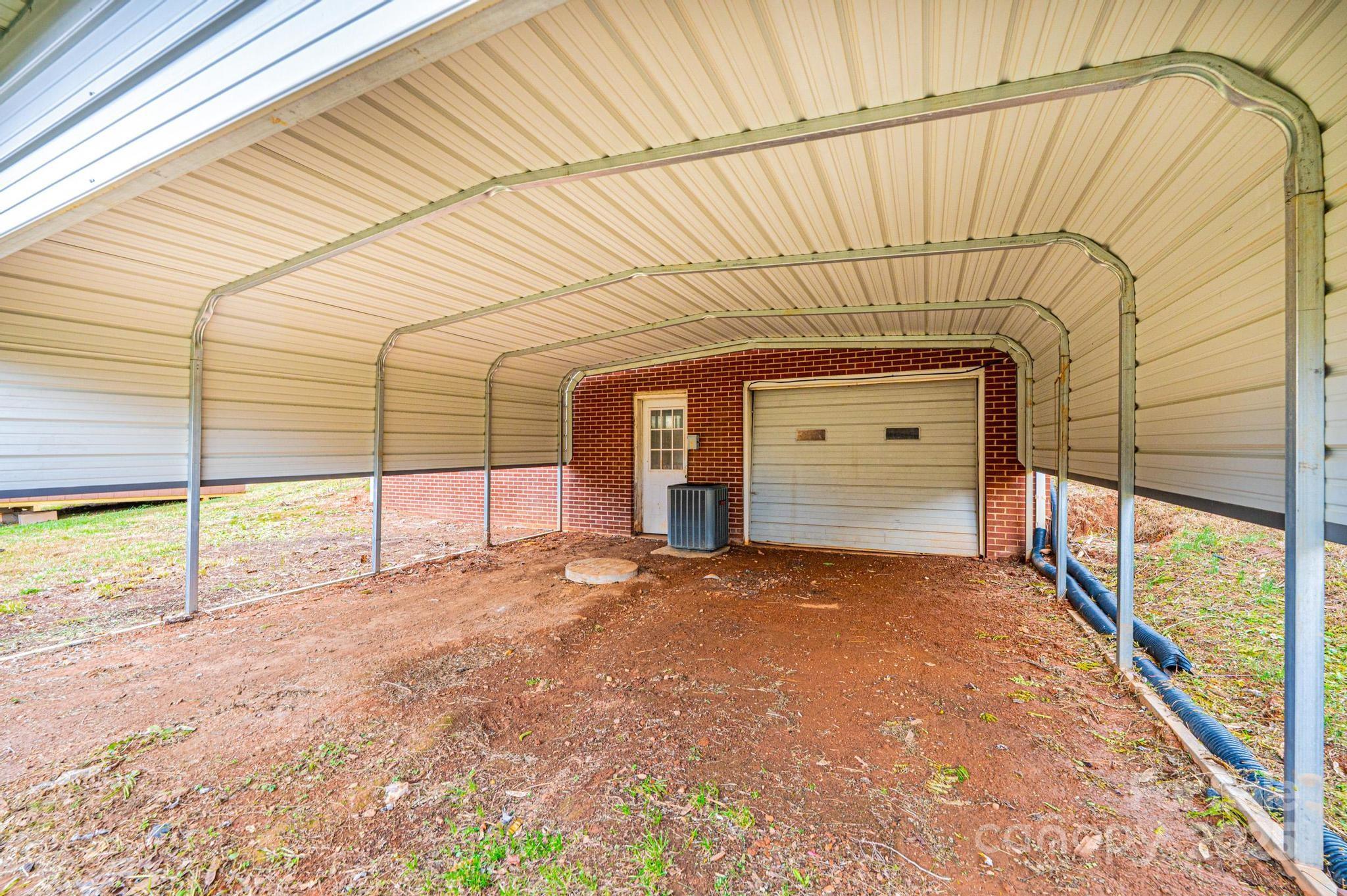 1214 Dry Ponds Road Granite Falls, NC 28630 - Photo 28 of 39 a view of an empty room with a window