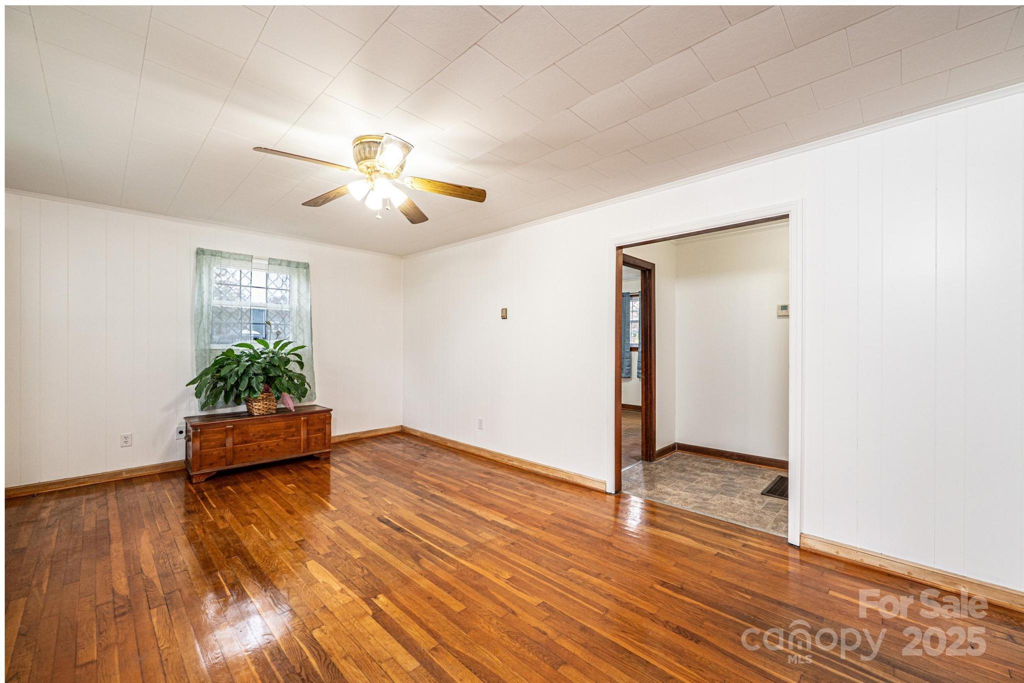 1214 Dry Ponds Road Granite Falls, NC 28630 - Photo 4 of 39 a view of an empty room and wooden floor