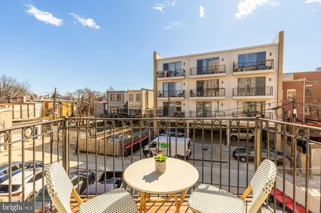 a view of a house with a door and a porch