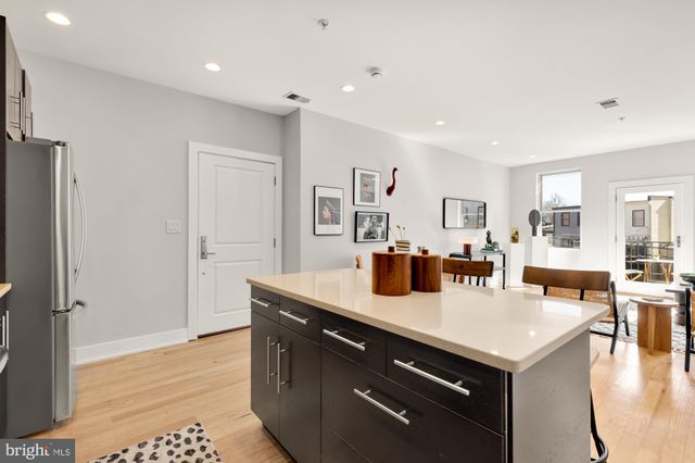 a view of dining table furniture and kitchen view