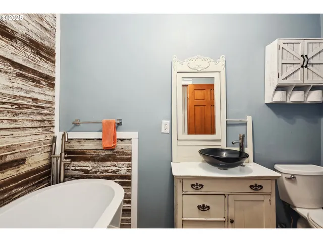 a kitchen with a stove and a microwave