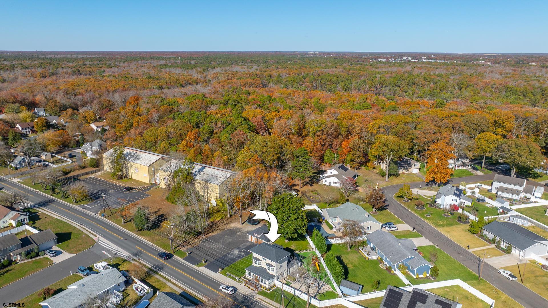 1203 West Mill Road Northfield, NJ 08225 - Photo 72 of 90 an aerial view of residential building and lake