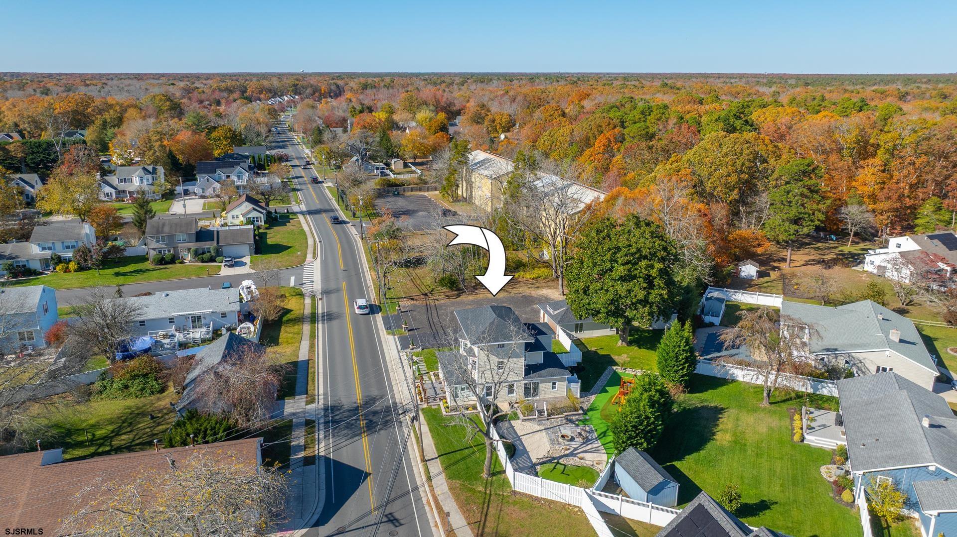 1203 West Mill Road Northfield, NJ 08225 - Photo 83 of 90 an aerial view of residential houses with outdoor space and swimming pool