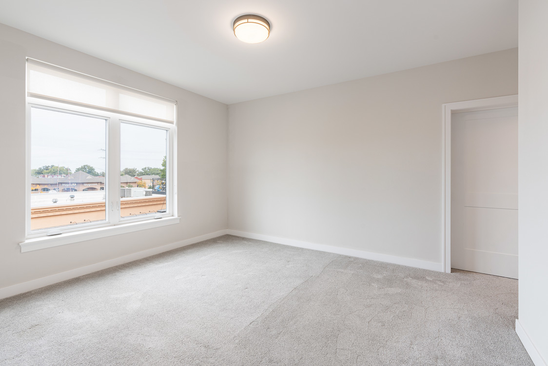 440 Green Bay Road, Unit 309 Highwood, IL 60040 - Photo 6 of 15 an empty room with a window