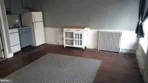 a view of a livingroom with a staircase