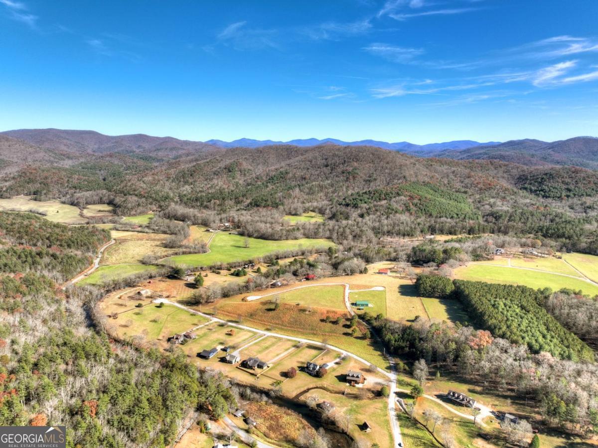47 Downy Road, Unit 2 Blue Ridge, GA 30513 - Photo 26 of 95 a view of a city with mountains in the background