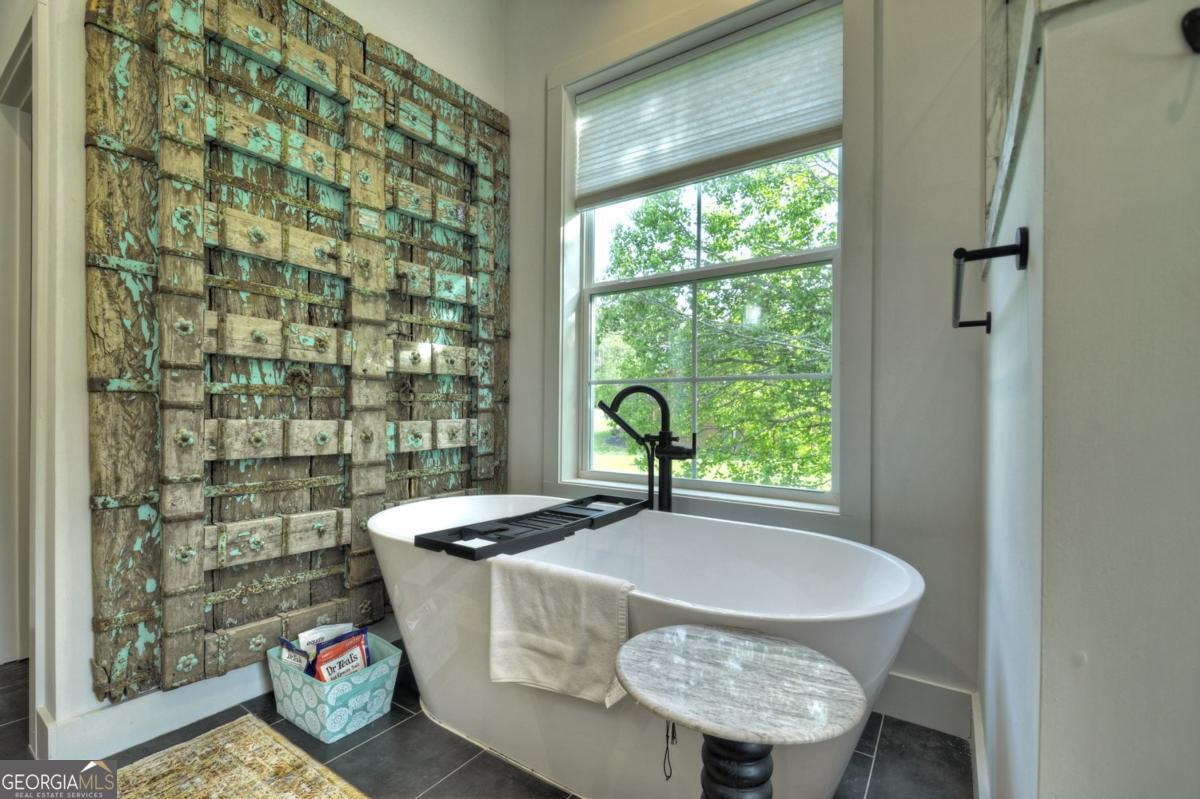 47 Downy Road, Unit 2 Blue Ridge, GA 30513 - Photo 3 of 95 a view of a dining room with furniture window and outside view
