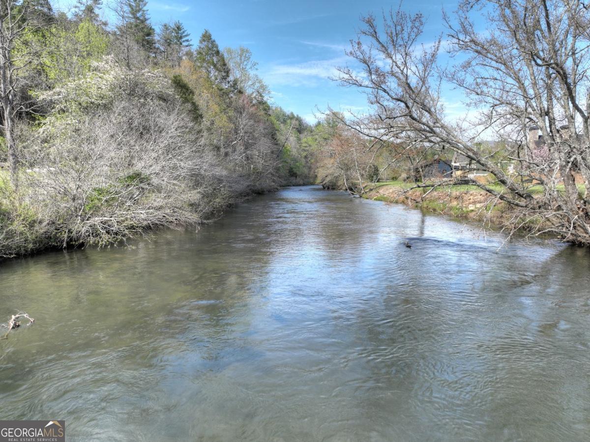 47 Downy Road, Unit 2 Blue Ridge, GA 30513 - Photo 35 of 95 a view of a lake with mountains in the background