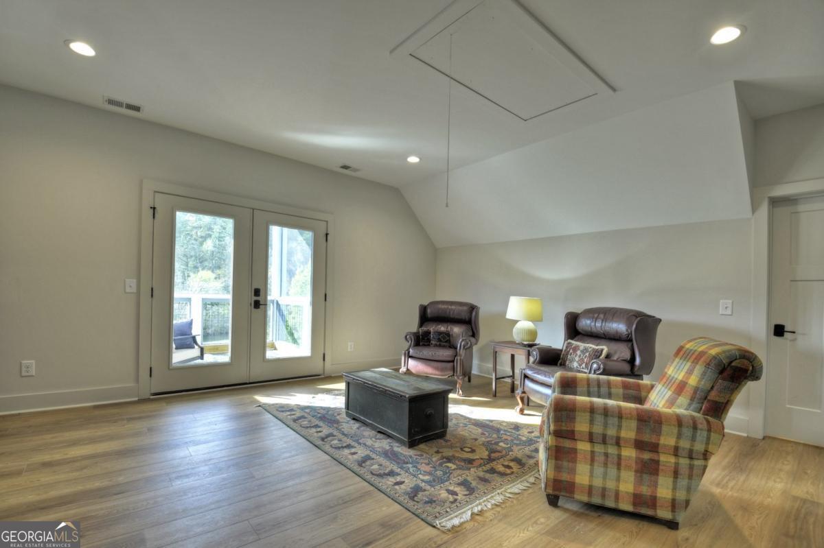 47 Downy Road, Unit 2 Blue Ridge, GA 30513 - Photo 36 of 95 a living room with furniture and a window