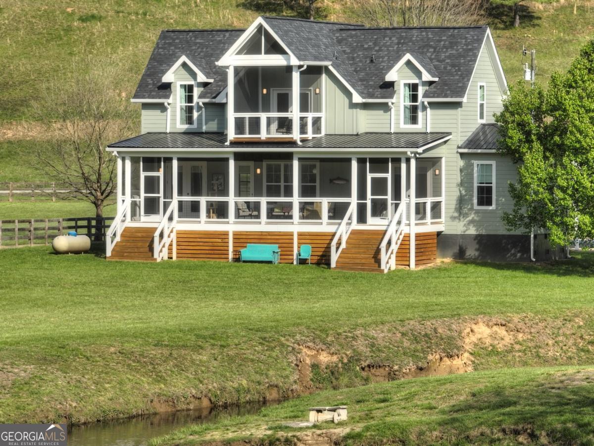 47 Downy Road, Unit 2 Blue Ridge, GA 30513 - Photo 38 of 95 a front view of a house with a yard