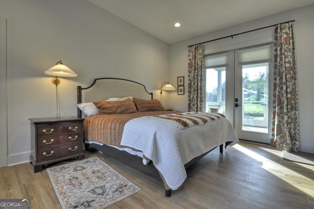 47 Downy Road, Unit 2 Blue Ridge, GA 30513 - Photo 55 of 95 a bedroom with a bed and a large window