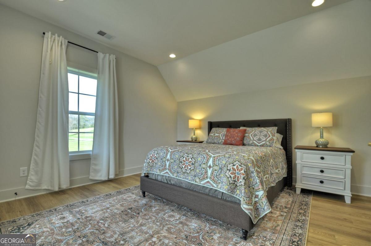47 Downy Road, Unit 2 Blue Ridge, GA 30513 - Photo 76 of 95 a bedroom with a bed and a window
