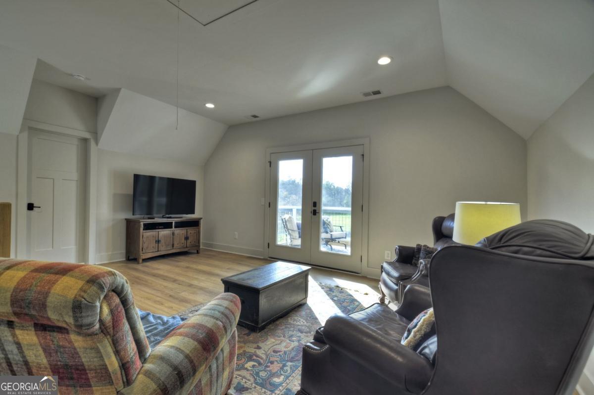 47 Downy Road, Unit 2 Blue Ridge, GA 30513 - Photo 83 of 95 a living room with furniture and a flat screen tv