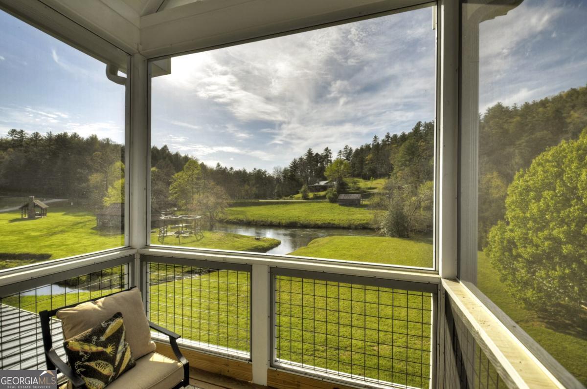 47 Downy Road, Unit 2 Blue Ridge, GA 30513 - Photo 84 of 95 a view of a balcony with lake view and mountain view