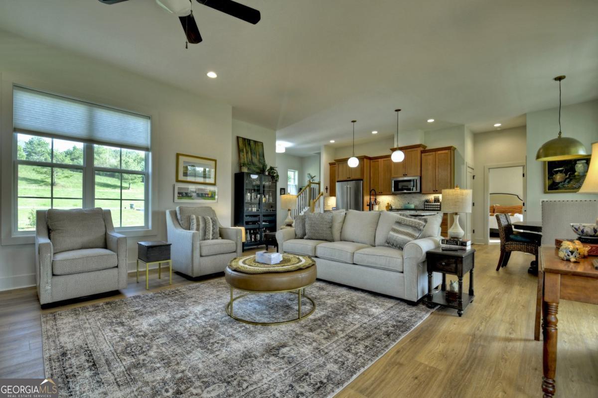 47 Downy Road, Unit 2 Blue Ridge, GA 30513 - Photo 91 of 95 a living room with furniture and a wooden floor