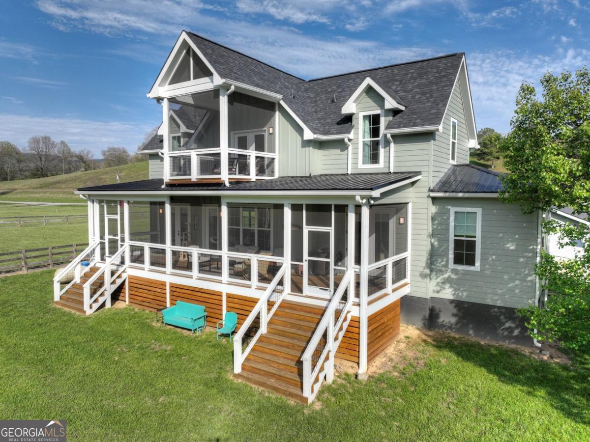 47 Downy Road, Unit 2 Blue Ridge, GA 30513 - Photo 93 of 95 a view of a house with a yard