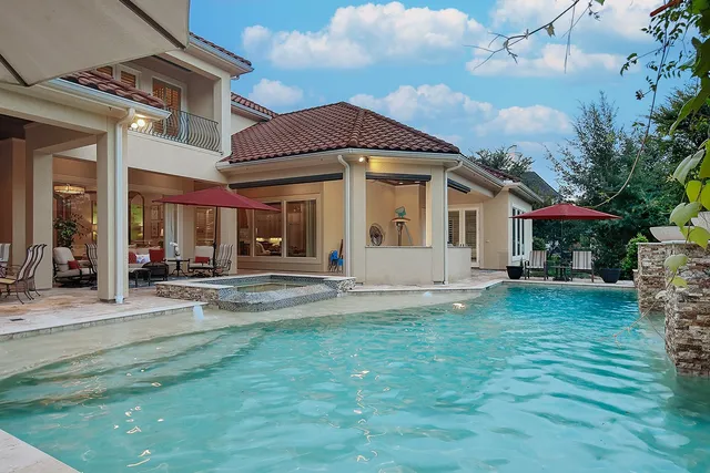 a view of a house with a yard porch and sitting area