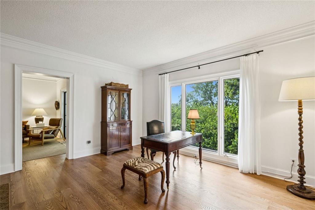 2765 Peachtree Road Northeast, Unit 3 Atlanta, GA 30305 - Photo 13 of 30 a living room with furniture and a large window