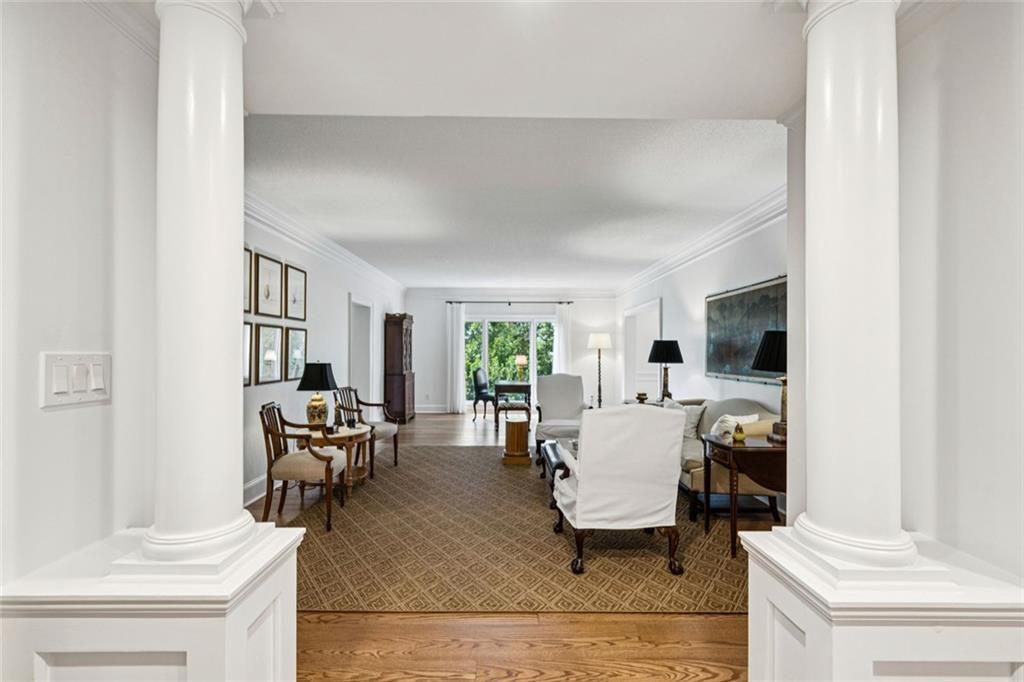 2765 Peachtree Road Northeast, Unit 3 Atlanta, GA 30305 - Photo 16 of 30 a living room with furniture and a flat screen tv