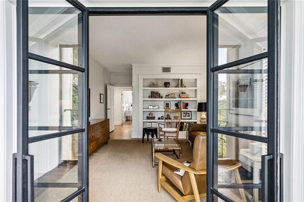 2765 Peachtree Road Northeast, Unit 3 Atlanta, GA 30305 - Photo 19 of 30 a view of store room with wooden floor