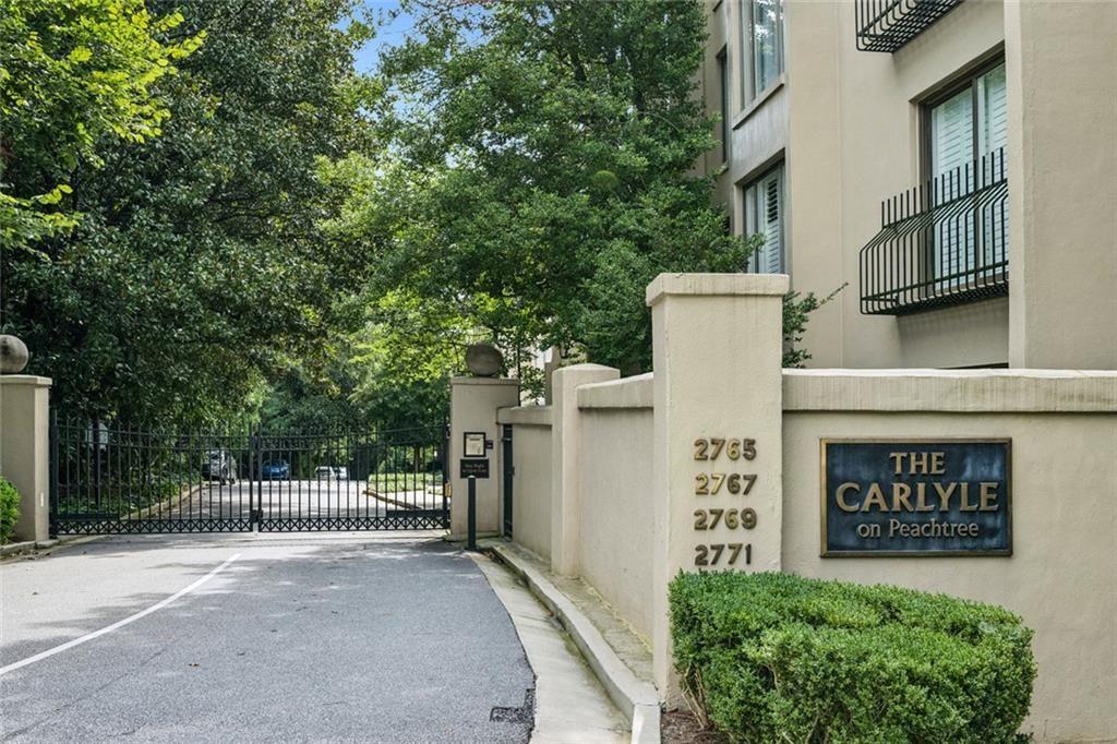 2765 Peachtree Road Northeast, Unit 3 Atlanta, GA 30305 - Photo 2 of 30 a view of a street with sitting area