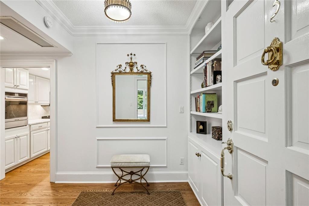 2765 Peachtree Road Northeast, Unit 3 Atlanta, GA 30305 - Photo 4 of 30 a view of kitchen with furniture and wooden floor