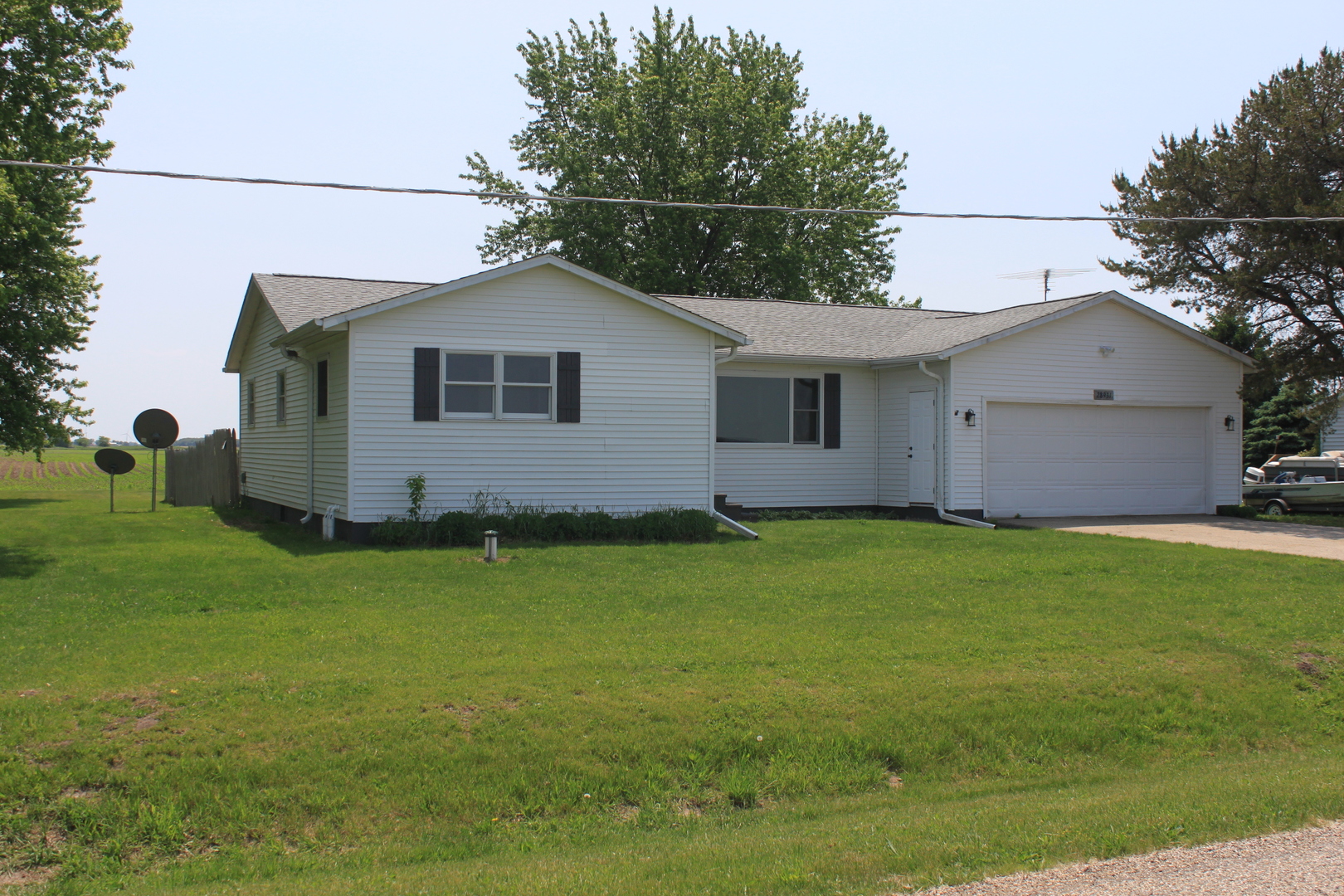 28931 Bell Road Rock Falls, IL 61071 - Photo 1 of 13 a backyard of a house with lots of green space