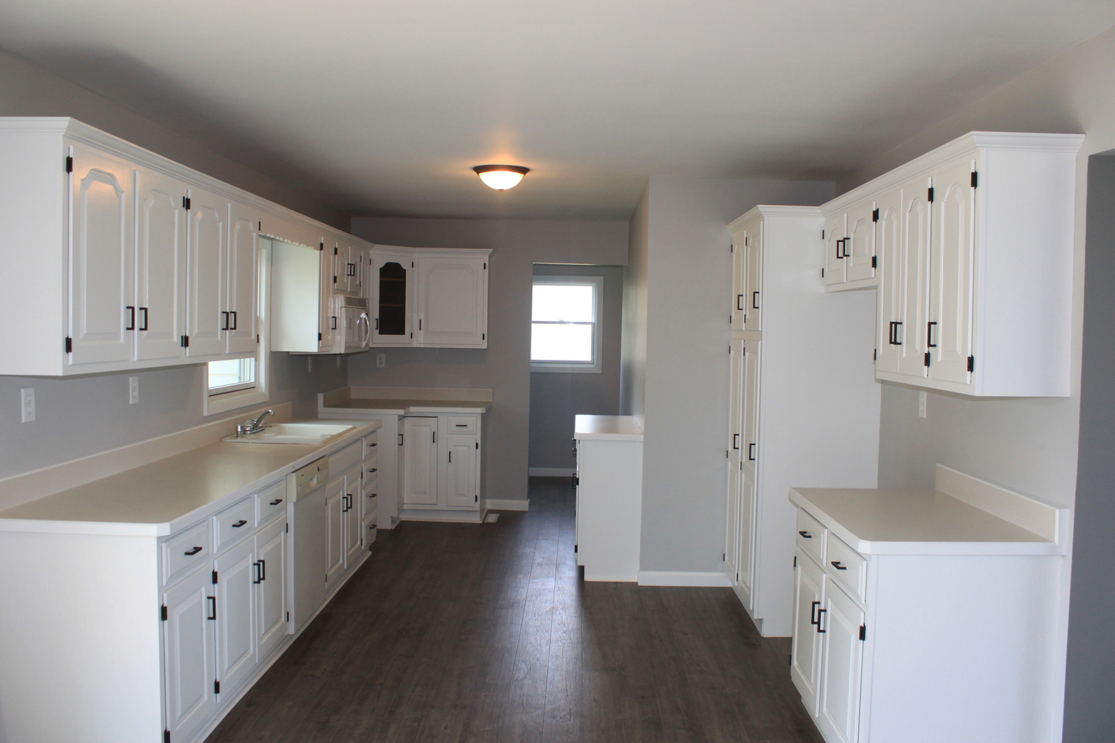 28931 Bell Road Rock Falls, IL 61071 - Photo 2 of 13 a kitchen with cabinets a sink and a large refrigerator