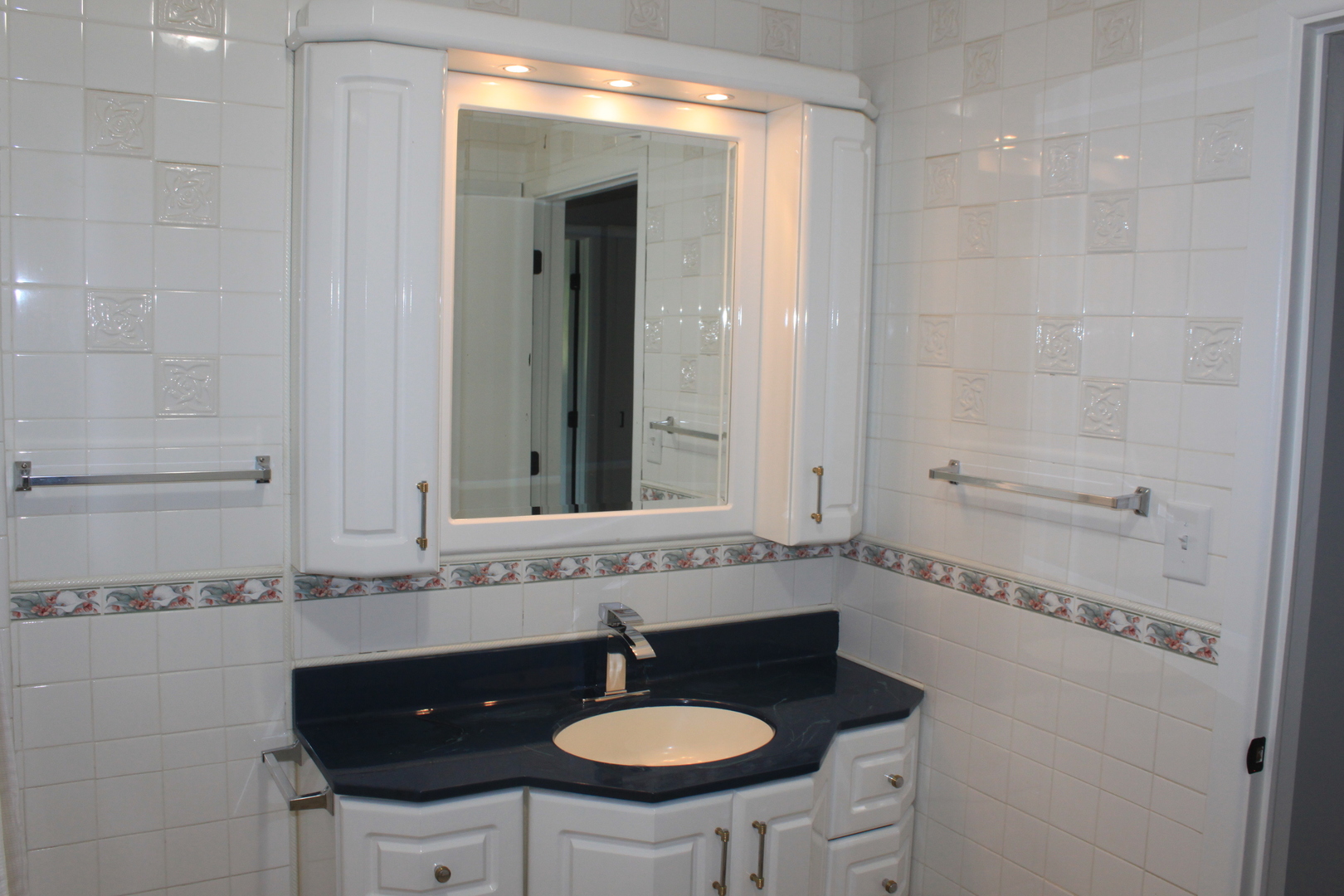 28931 Bell Road Rock Falls, IL 61071 - Photo 9 of 13 a bathroom with a sink and a mirror