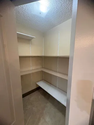 a storage room with empty racks