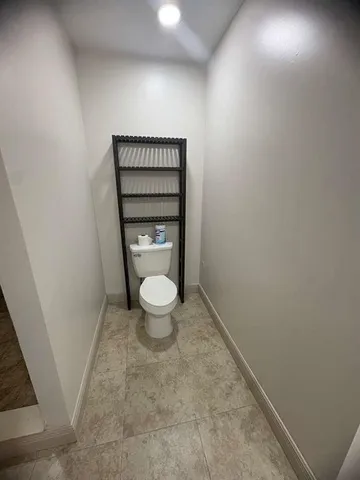 a bathroom with a toilet