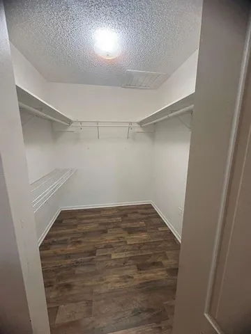 a view of a room with an empty space