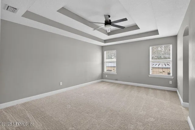 a view of a bathroom from a hallway