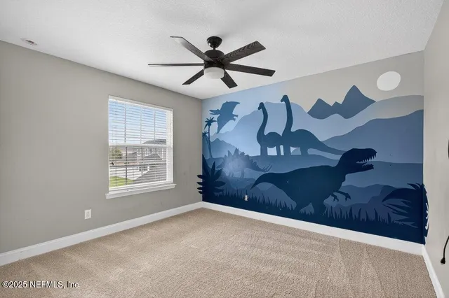 an empty room with closet area