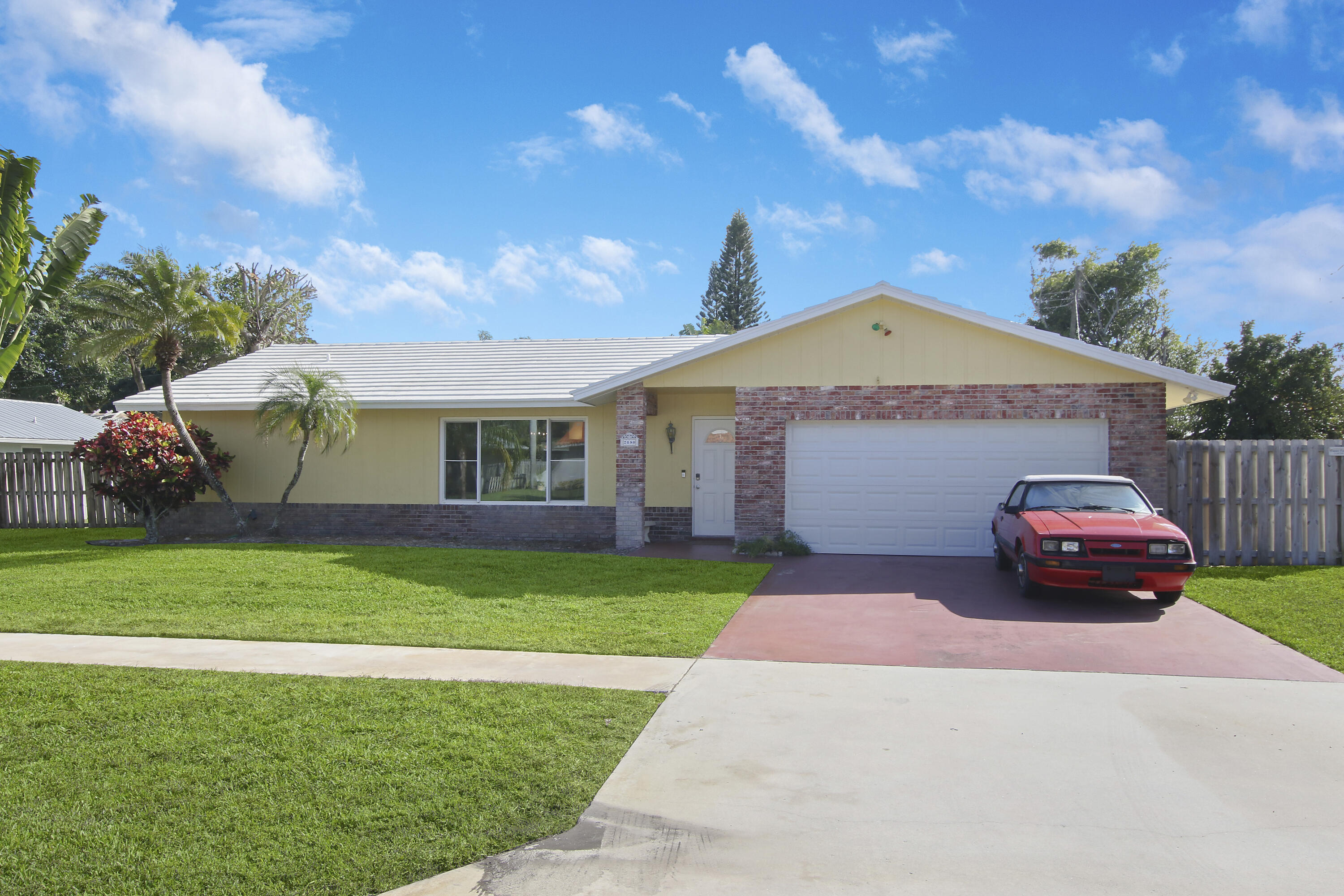 2480 Windsor Road Palm Beach Gardens, FL 33410 - Photo 5 of 44 Front elevation