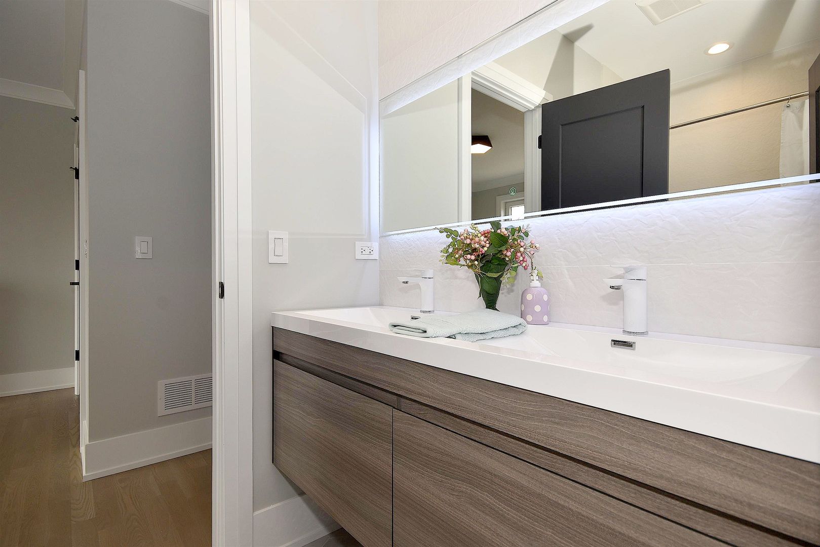 3723 North Oakley Avenue Chicago, IL 60618 - Photo 22 of 36 a bathroom with a sink and a mirror