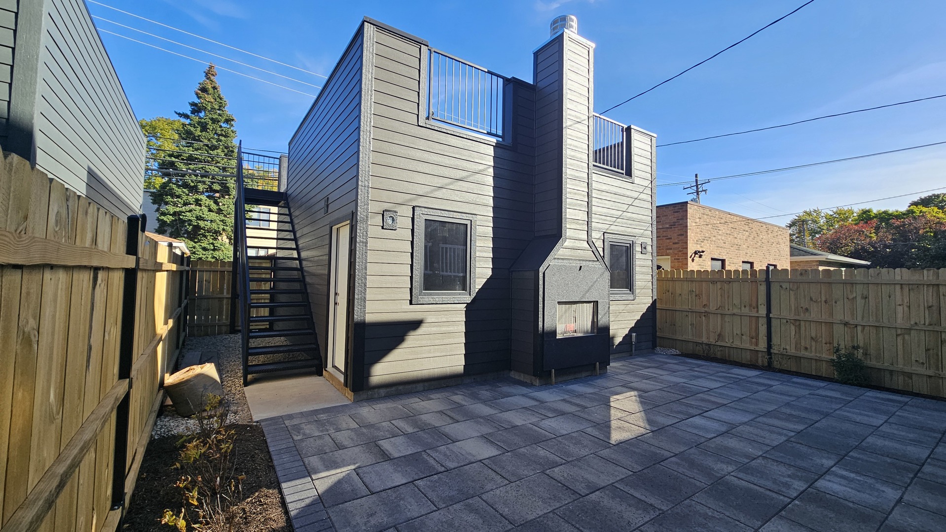 3723 North Oakley Avenue Chicago, IL 60618 - Photo 29 of 36 a view of a backyard with sitting area