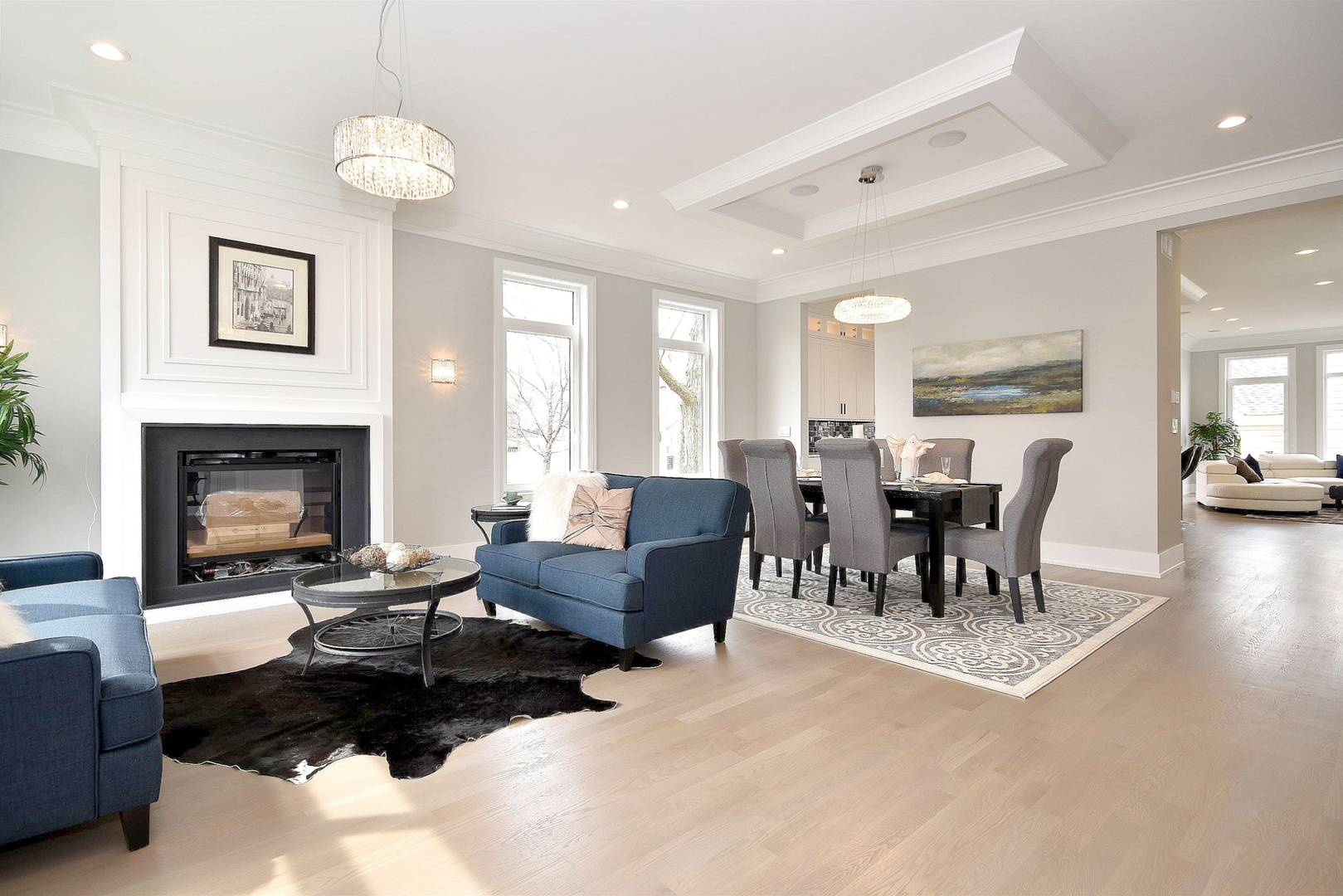 3723 North Oakley Avenue Chicago, IL 60618 - Photo 4 of 36 a living room with furniture dining table a fireplace and a large window