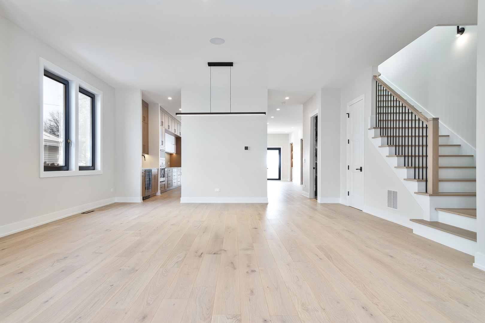 3723 North Oakley Avenue Chicago, IL 60618 - Photo 5 of 36 a view of empty room with wooden floor and fan