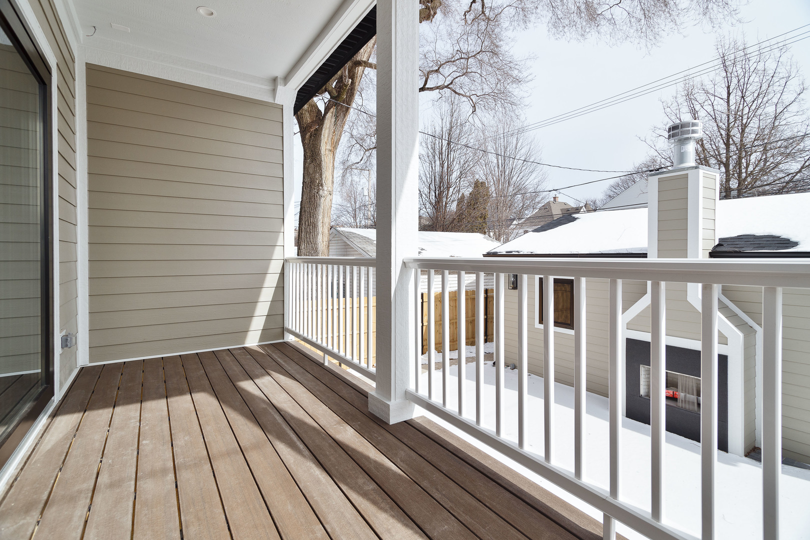 3723 North Oakley Avenue Chicago, IL 60618 - Photo 9 of 36 a view of a balcony with wooden floor