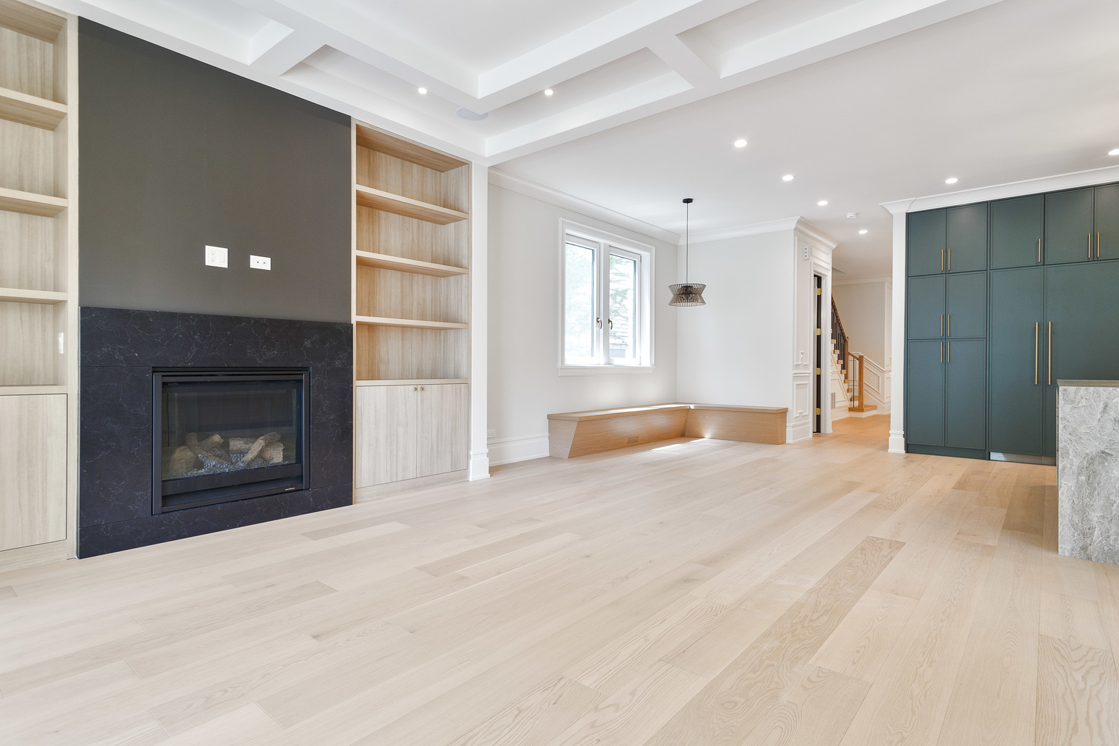3723 North Oakley Avenue Chicago, IL 60618 - Photo 10 of 36 a view of an empty room with a fireplace and a window