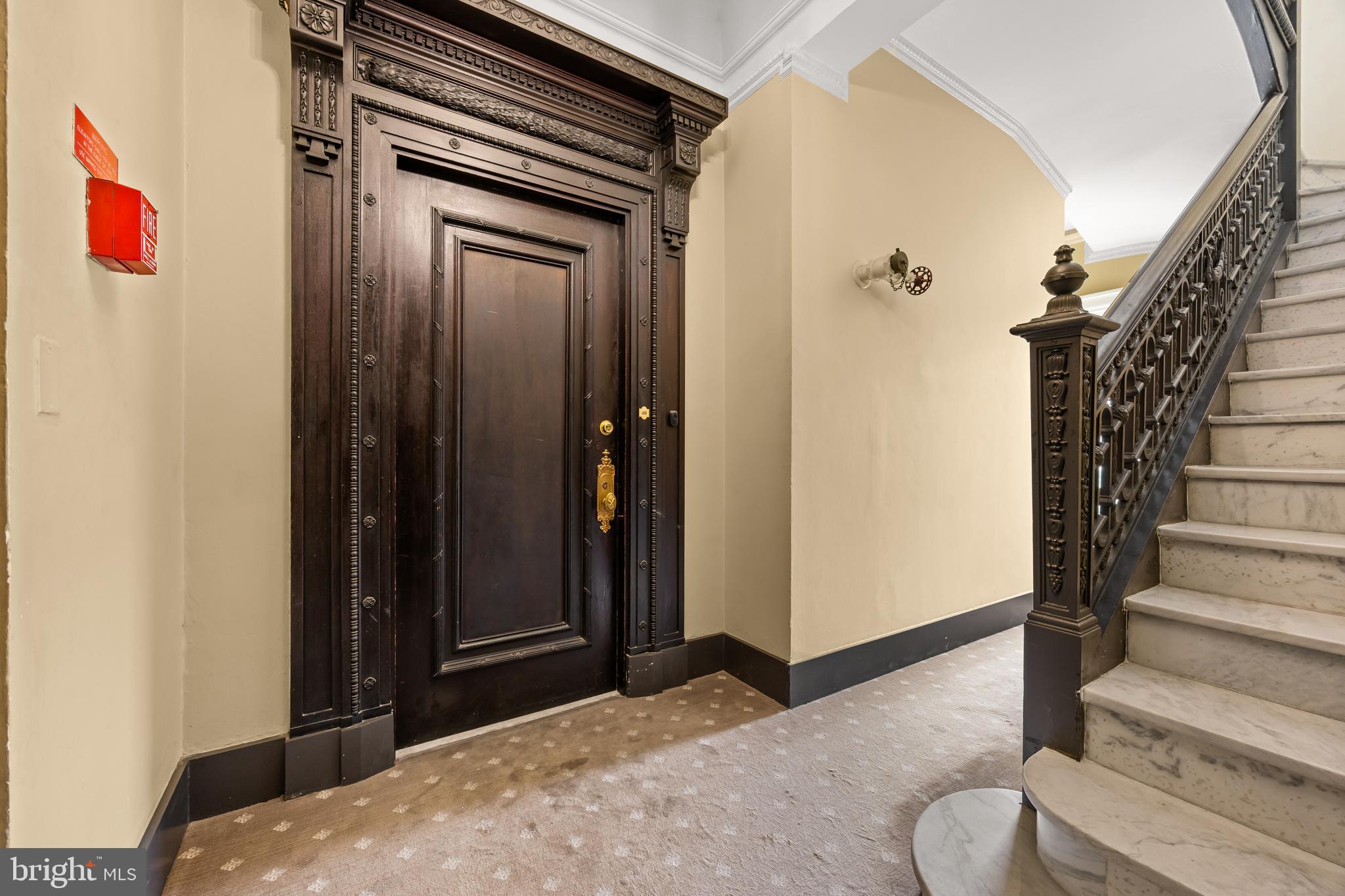 700 Washington Place, Unit 4B Baltimore, MD 21201 - Photo 5 of 67 a view of hallway with wooden floor and stairs
