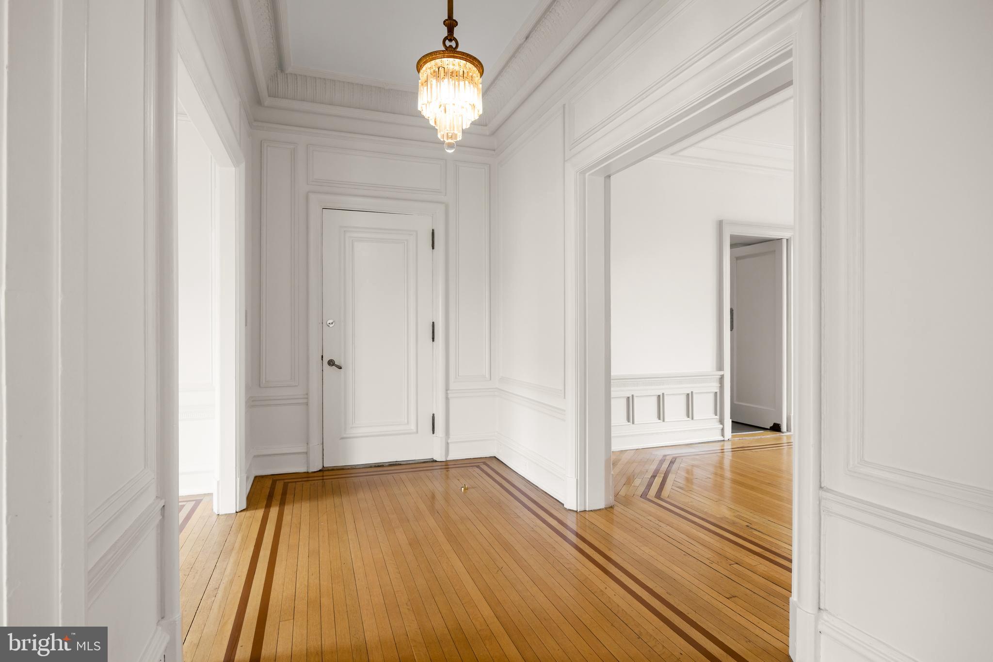 700 Washington Place, Unit 4B Baltimore, MD 21201 - Photo 7 of 67 a view of a room with wooden floor and a window