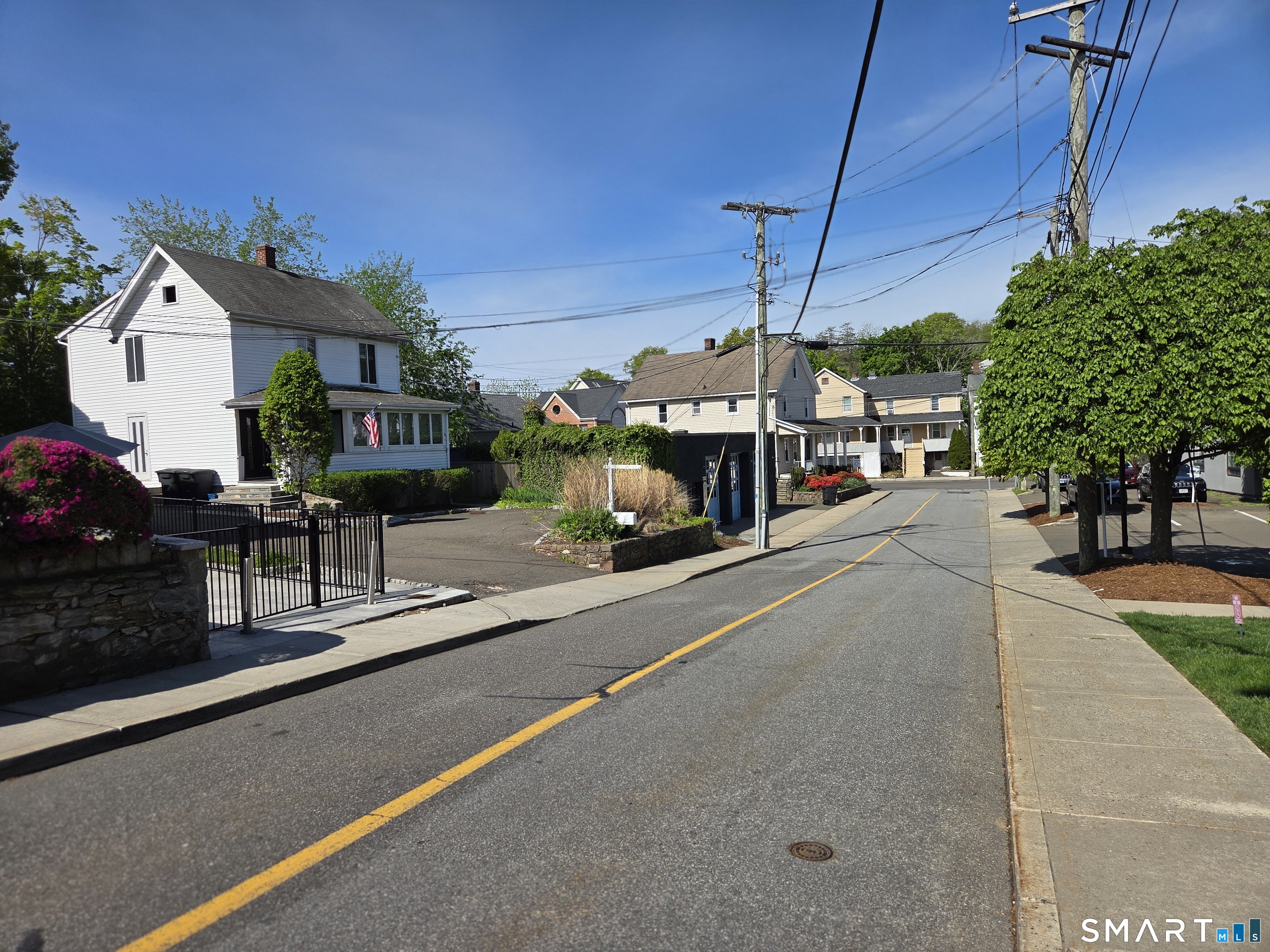 19 Ketchum Street Westport, CT 06880 - Photo 3 of 4 a view of a street with cars