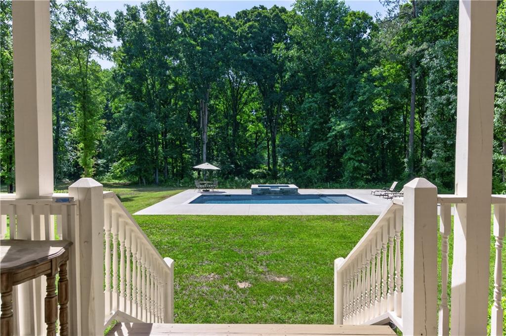 632 Geiger Road Jefferson, GA 30549 - Photo 42 of 55 a view of a house with a yard and sitting area